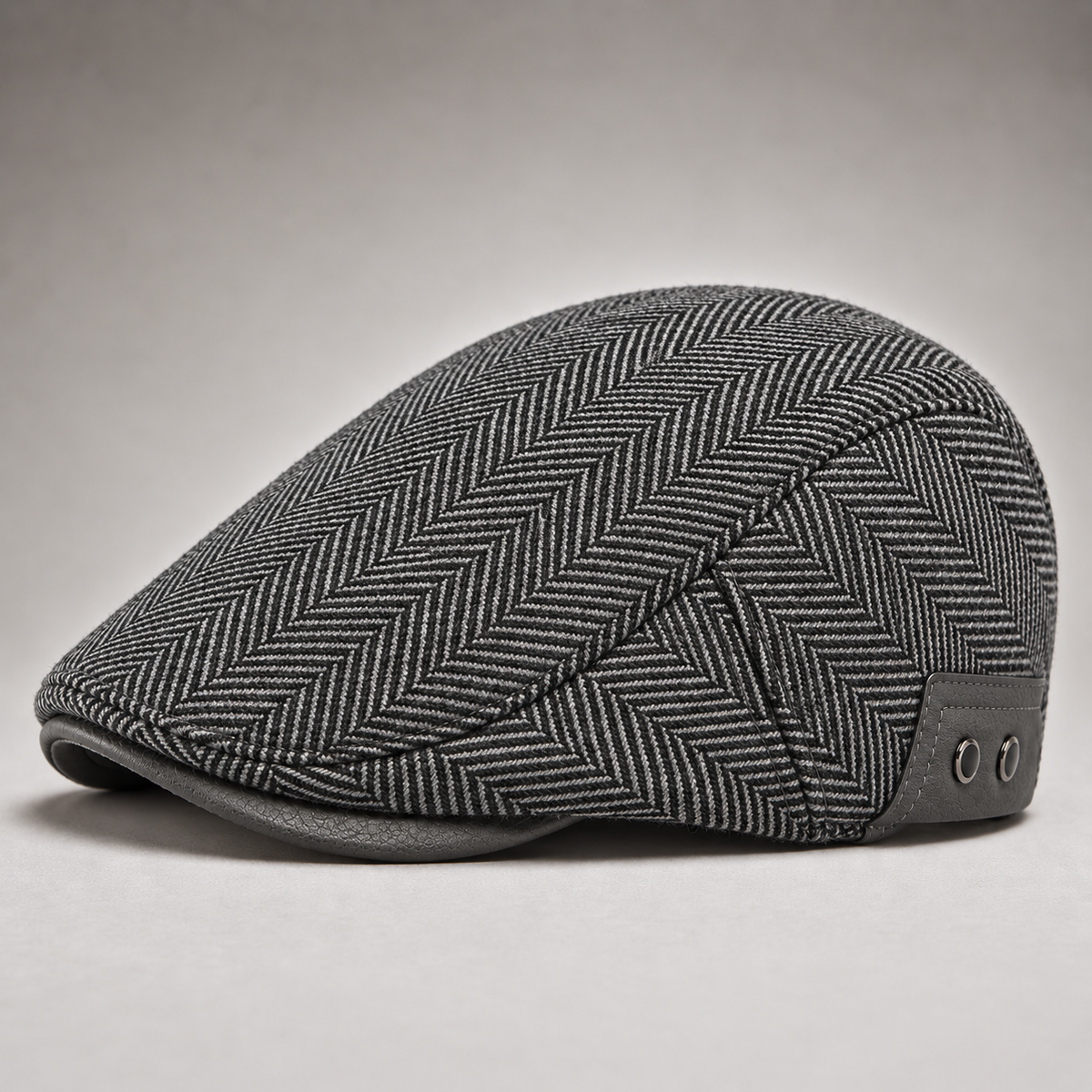 Fernand, casquette à chevrons grise, cache-oreilles repliés